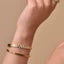Golden cartier with shiny stones